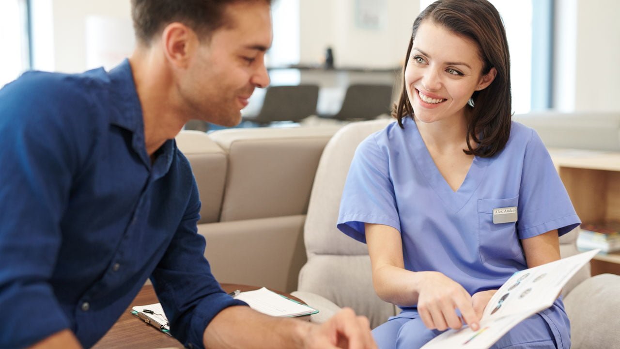 Nurse Talking to Patient